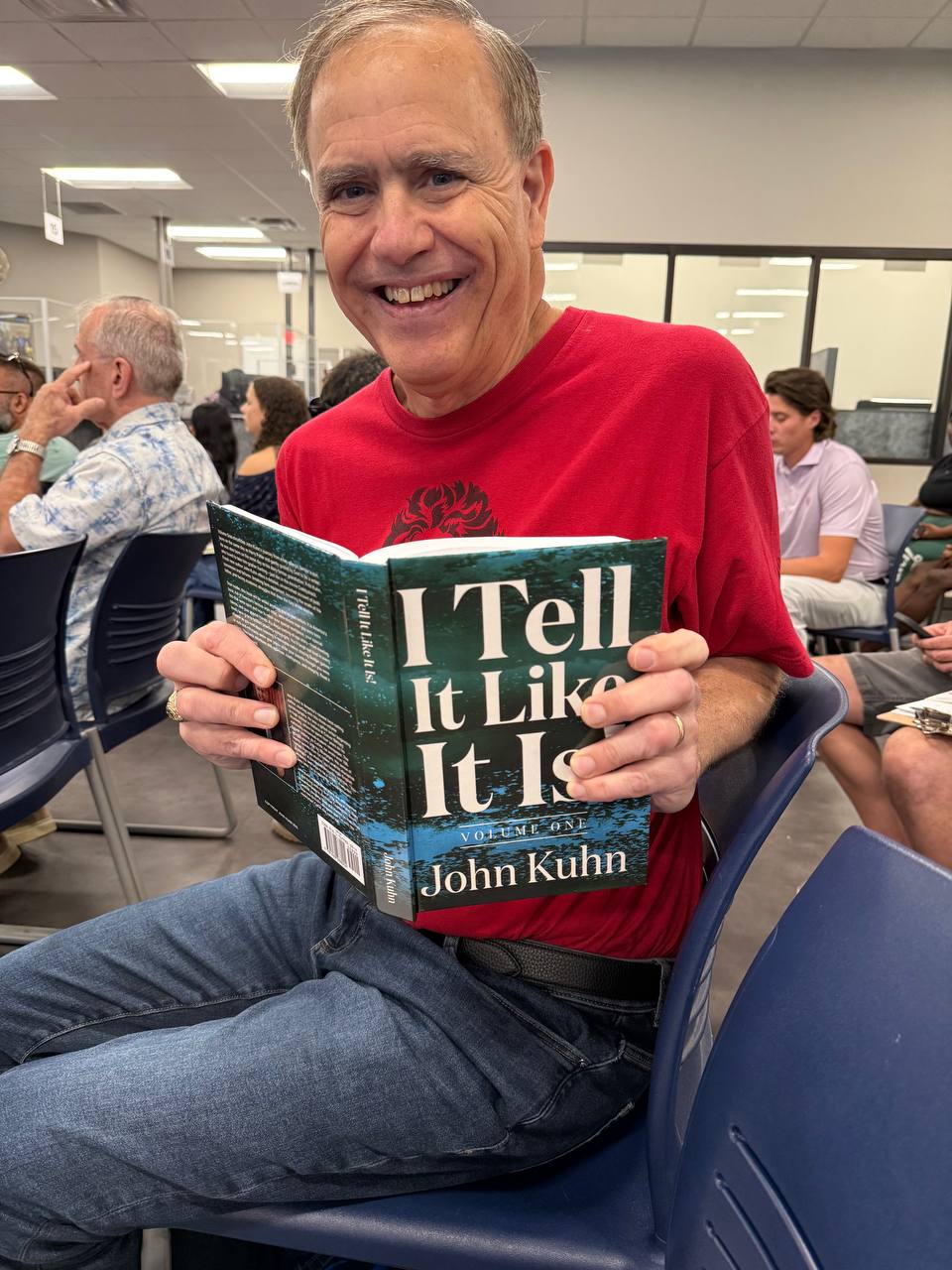 John Kuhn reading I Tell It Like It Is at an event